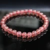 The 15-year-old store's White Jade crystal Pearl Treasure Strawberry Crystal 4mm with three rings Item Picture